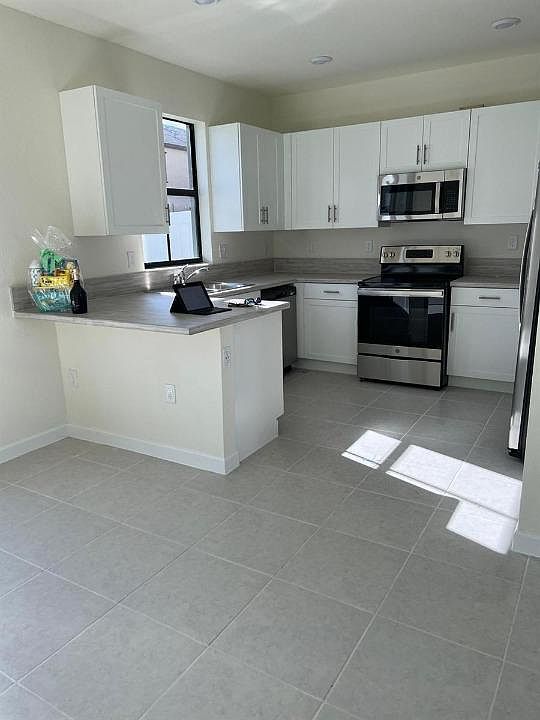2nd image of 11102 W 33rd Ct #11100