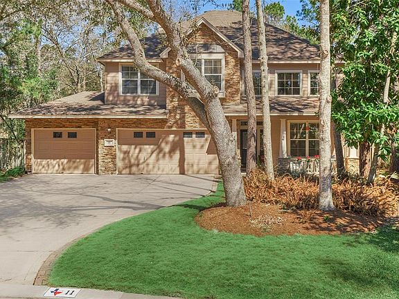 Stunning home located at 11 Wild Aster Court in The Woodlands, Alden Bridge!
