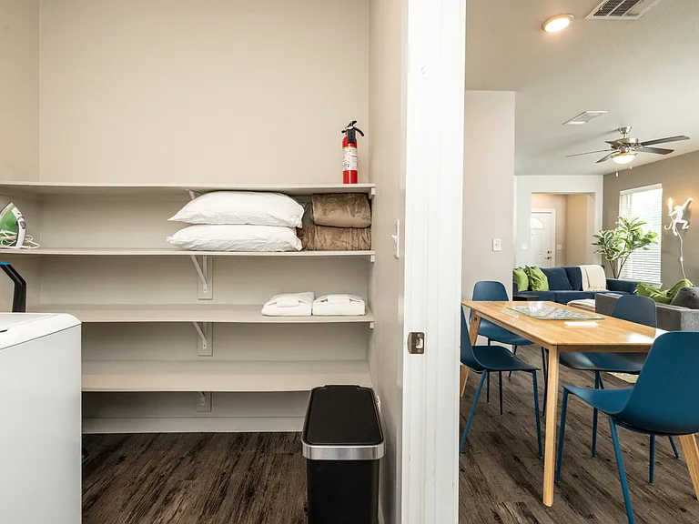 Laundry room with extra towels and blankets