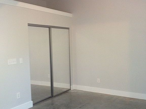 Bedroom with mirrored closet