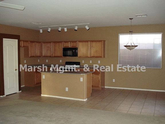 5th image of 9533 E Keats Ave