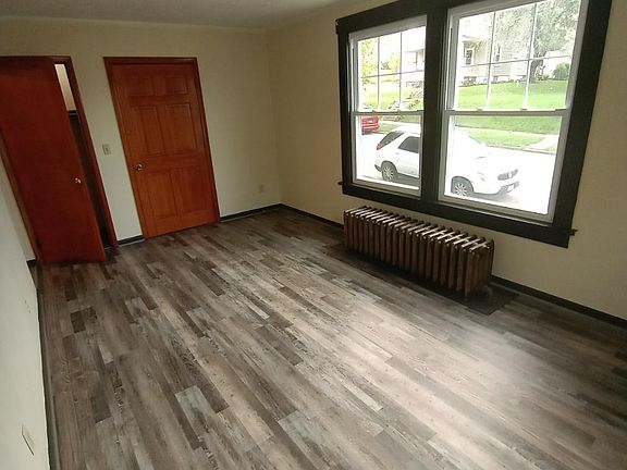 Large living room with new vinyl luxury tile flooring