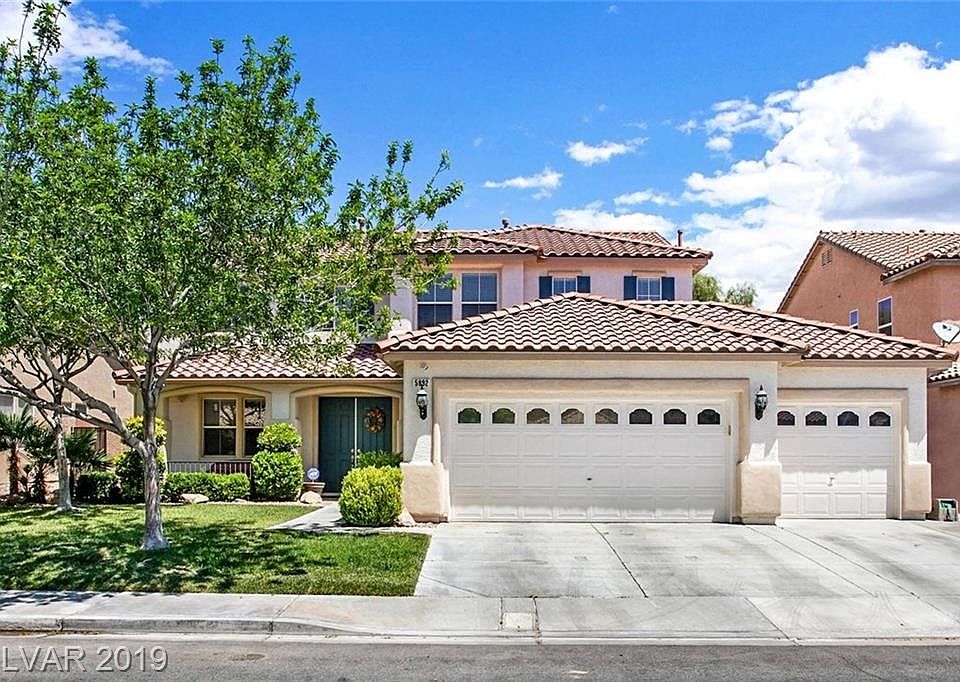 Beautiful home with covered porch, double door entry and 3 car garage.