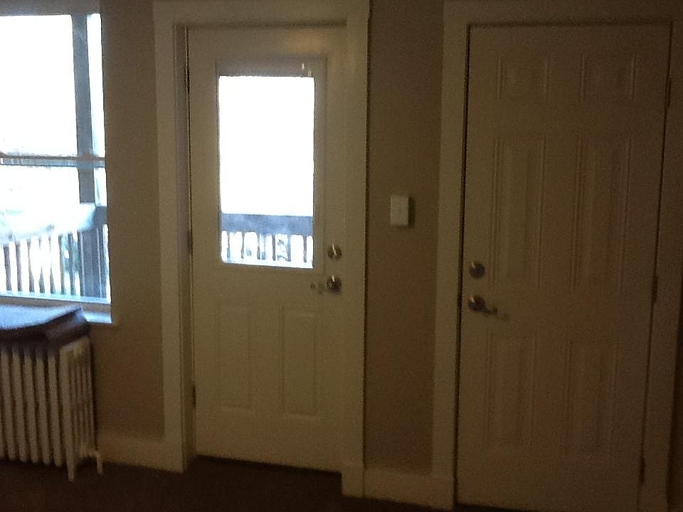 Door to private balcony. Room can be used as a living room or bedroom.