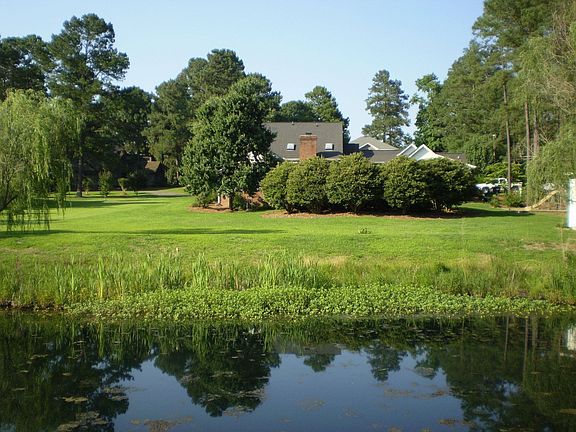 Ext back of home w/golf&pond view