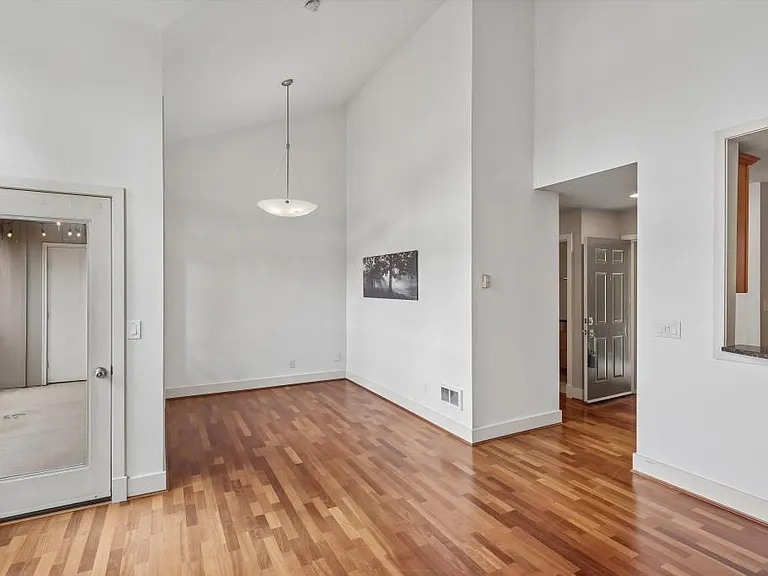 View of living room into dining/flex space