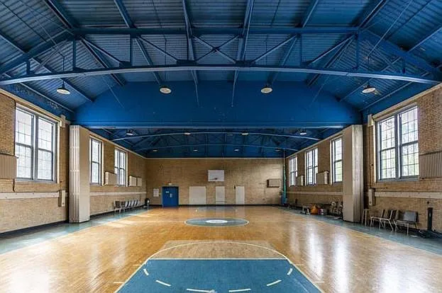Common area - Gymnasium with basketball goals and shared gym equipment
