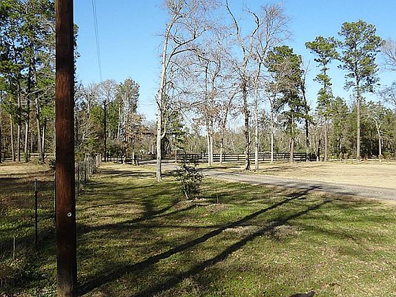 This is a view of the west fenceline from the front yard towards Riley Rd. showing the recent gravel