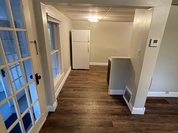Living room looking into kitchen