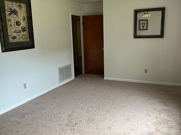 Living room with new carpet.