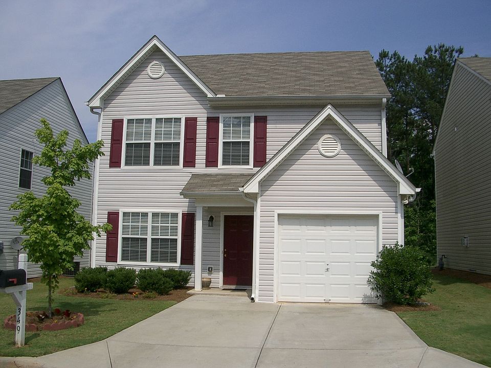 Silver Siding w/ Burgundy Shutters