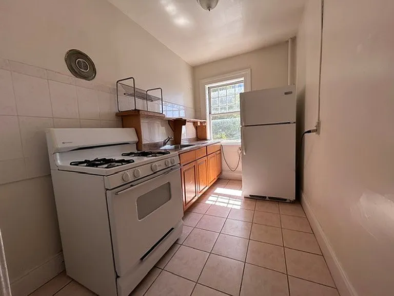 Coming soon, Spacious, Studio, One Bath Unit, with upgraded floors, above commercial shops — Photo 1