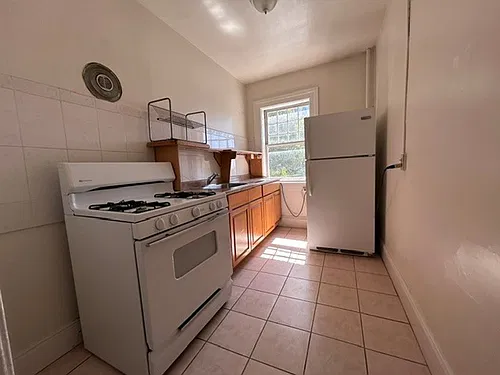 Coming soon, Spacious, Studio, One Bath Unit, with upgraded floors, above commercial shops Photo 1