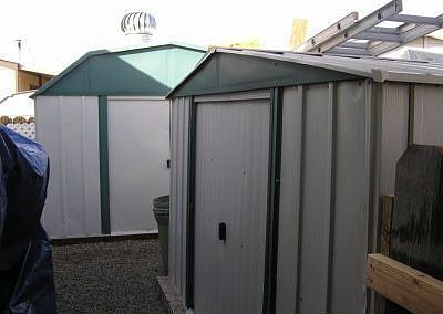 2 storage sheds/work area