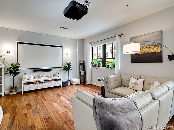 How COOL IS THAT??? Get the picture.....uhhhh I mean the screen???? After a hard day at work, well you know! This is your Livingroom/entertainment space!