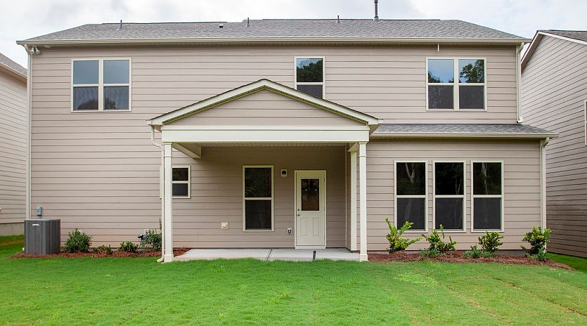 Rear exterior with 4 Gathering room extension and covered lanai