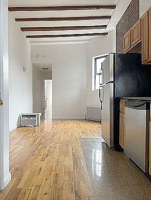 2nd image of 107 E 10th St APT 5C