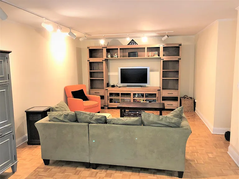 end of the living room with furniture