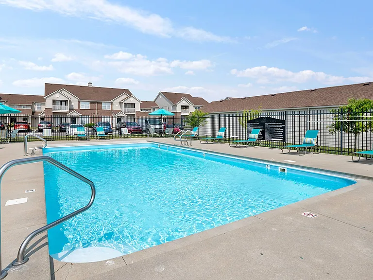 Huge Swimming Pool with Lounge Chairs