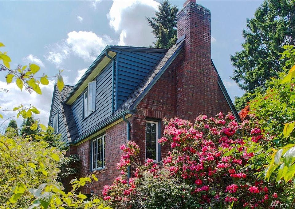 Lovely gardens surround this charming home.