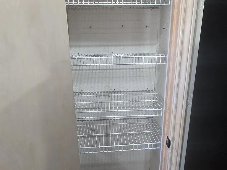 Full size pantry in kitchen.