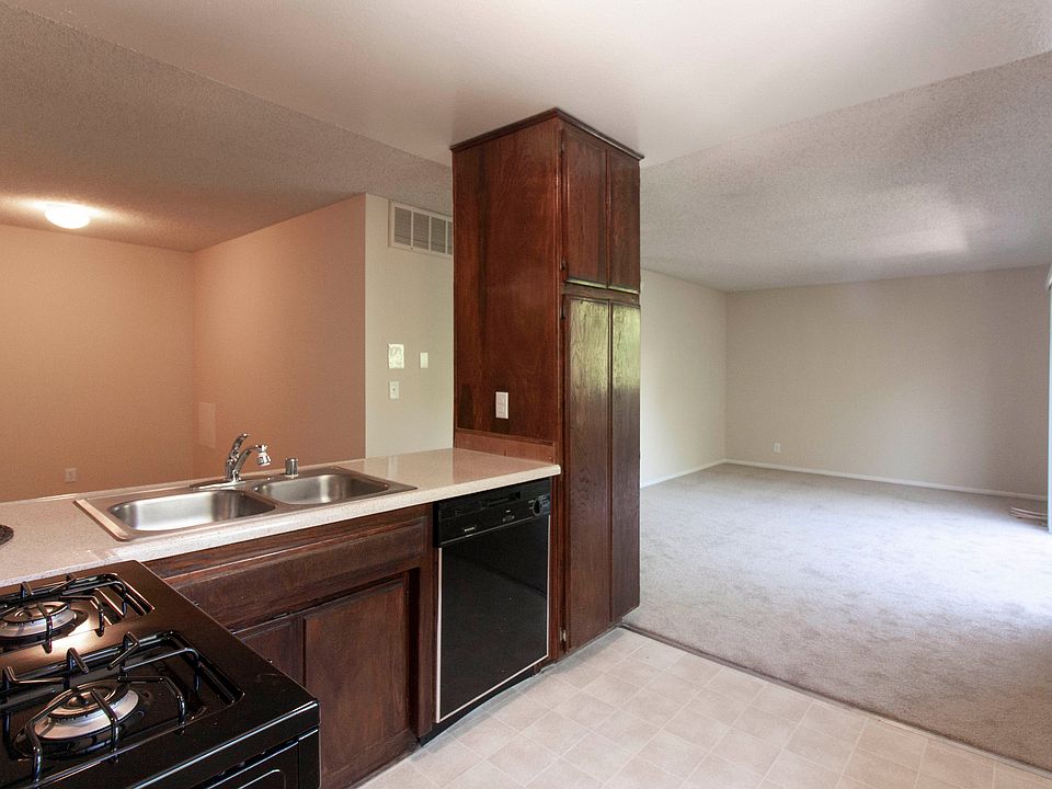 Kitchen, living room, & bonus dining or office area (photo of similar apartment; this apartment does not include a balcony)