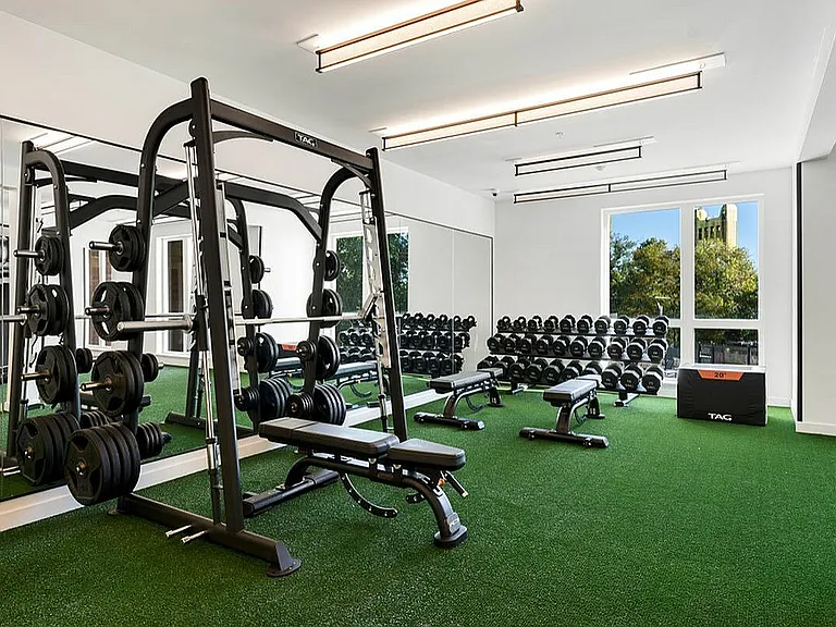 Elevate your workouts in this bright and fully equipped fitness center at 805 Riverfront in Sacramento with City View