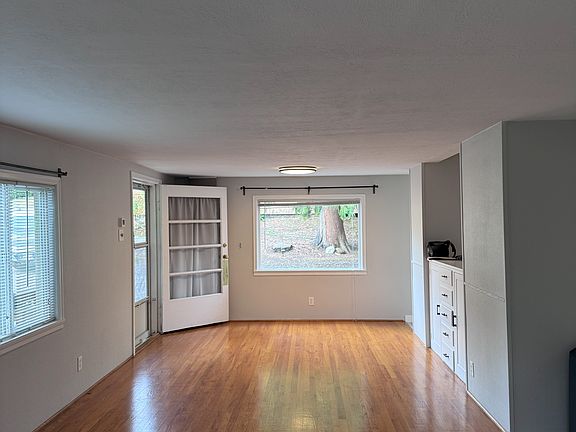 Living Room and Dining Room with Front Entry Door
