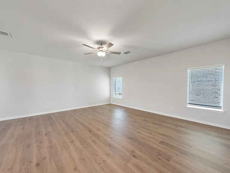 The family room is spacious, so everyone can have a seat.