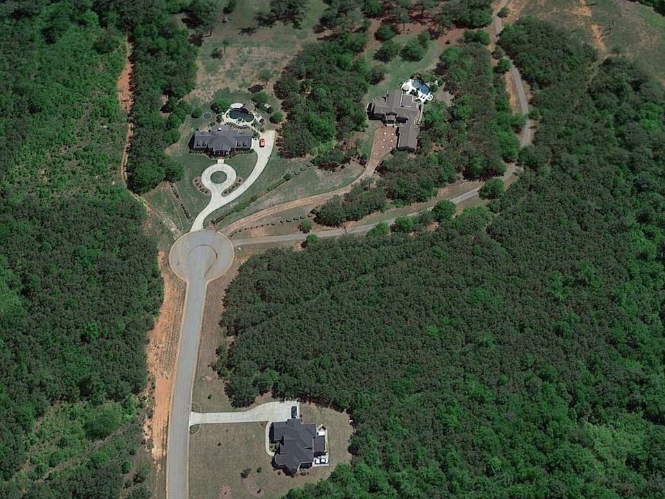 3+ Acre lot located on right before drive to recreational 6+ acre wooded lot and 27 acre lake.