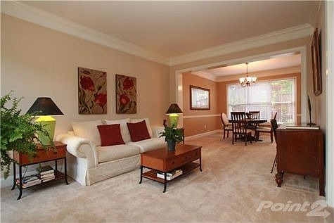 Living room and dinning room combination with lots of space to entertain.