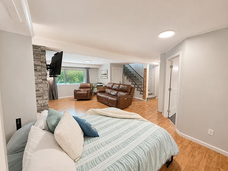 Family Room - Daylit Basement - Gas Fireplace - Large amount of Storage - Murphy Bed/Desk Office Area interchangeable - Adaptable for use as a Guest Suite with its own Bathroom.