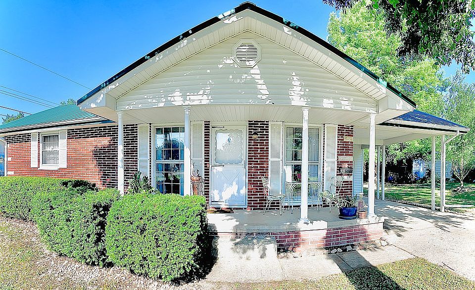 Brick & Metal Home on .24 Ac