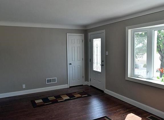 new 6 panel doors and an entrance door. Notice the 5" baseboards throughout the house. They add that