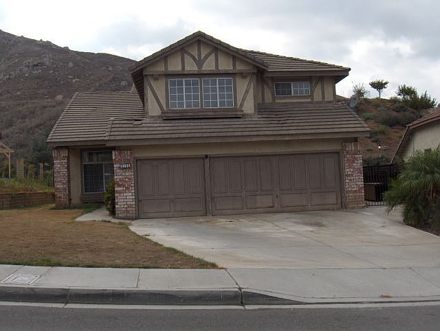 3 car garage, nestled against a hill