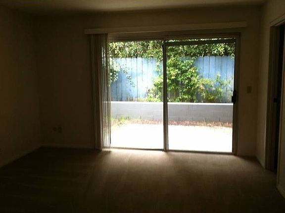 rear bedroom with slider