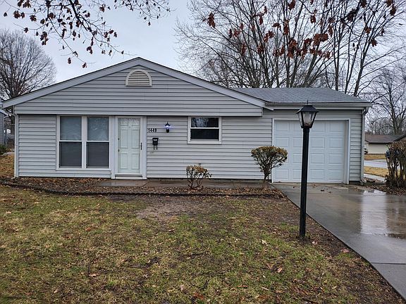 FRONT OF HOUSE. ONE CAR GARAGE