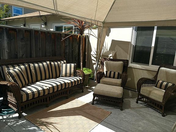 Deck. Furniture not included in listing.