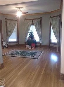 Foyer with inlaid wood flooring