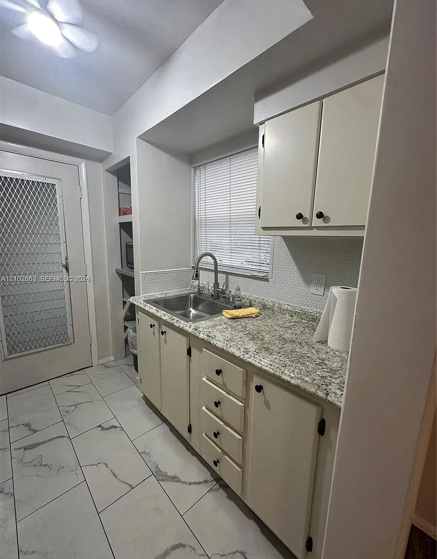 1050 E Sample Rd — Photo 3