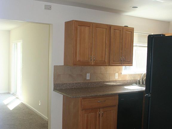 updated kitchen with den adjacent