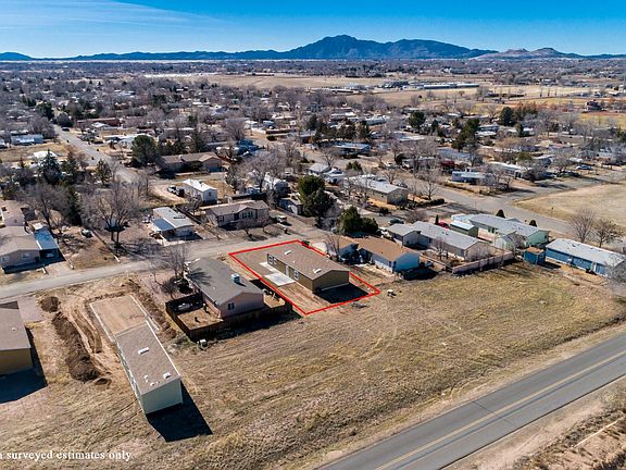 Arial views of Granite Mountain.  Nice open space behind home!