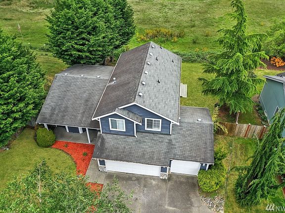 Aerial view of home and lot.