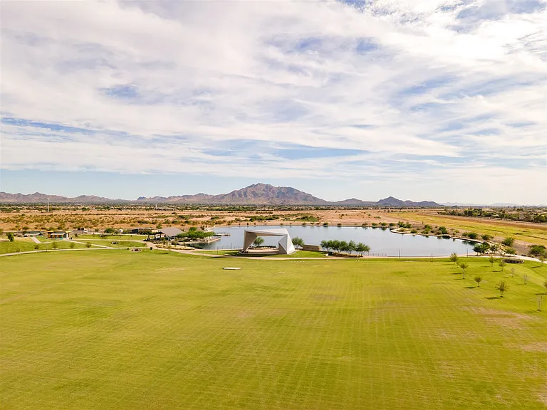 This incredible view is of Gilbert Regional Park-- only about a mile and a half away from the house. Great for cycling, and other recreation-- you can walk or cycle through the neighborhood's walking paths. Starbucks is also across the street.