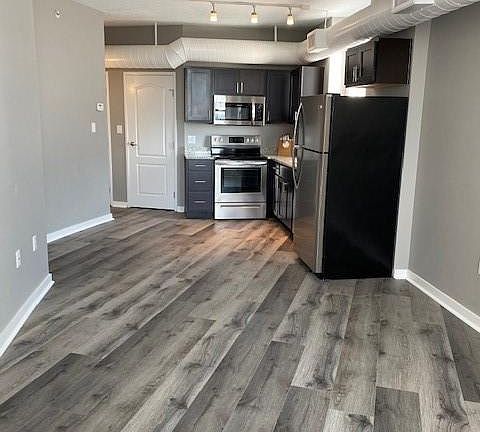 The Osborn 07 units. Open concept living, dining and kitchen area.