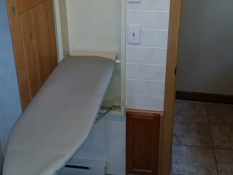 Laundry room has a washer and dryer on ceramic tile floor. If you wanted to bring your own washer and dryer.. that is also possible.