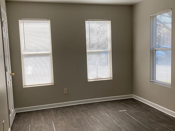 ONE OF THE BRIGHT BEDROOMS