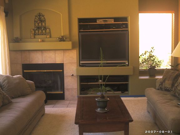 Family room with fireplace and entertainment niche!