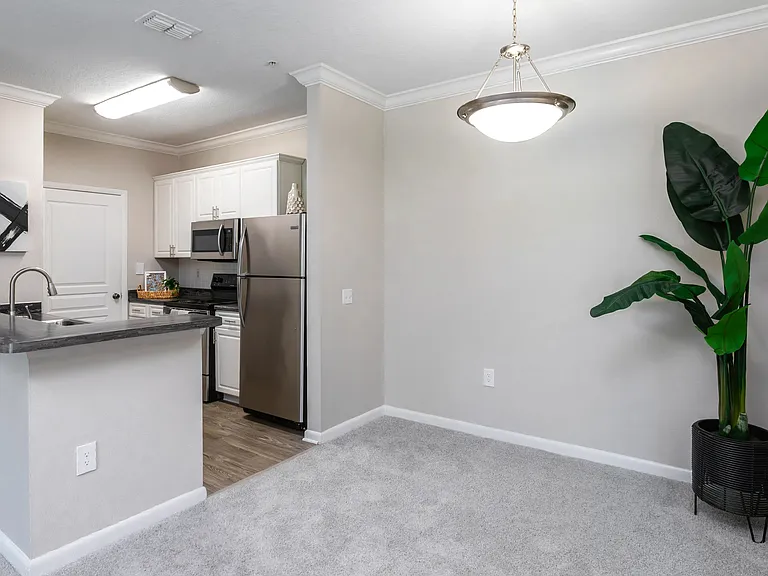 With a seamless connection between kitchen and dining space, this layout makes mealtime and entertaining effortless.