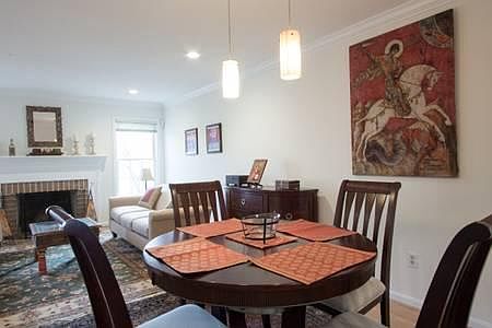 Dining/living room with wood burning fireplace